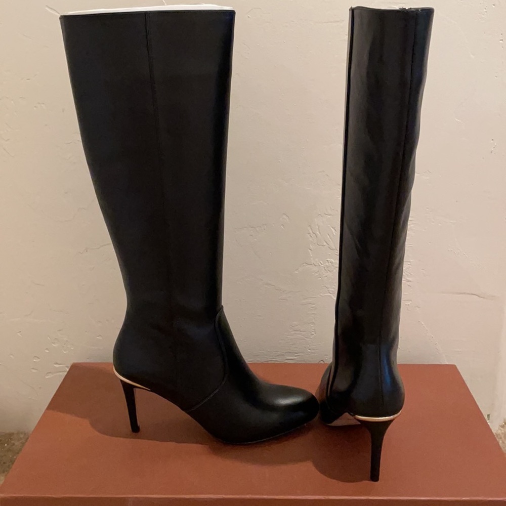 Coach heeled boots